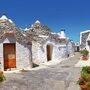 Unique Trulli houses with conical roofs in Alberobello, Italy, P